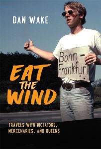 Photo of Dan Wake hitchhiking with the book title Eat the Wind